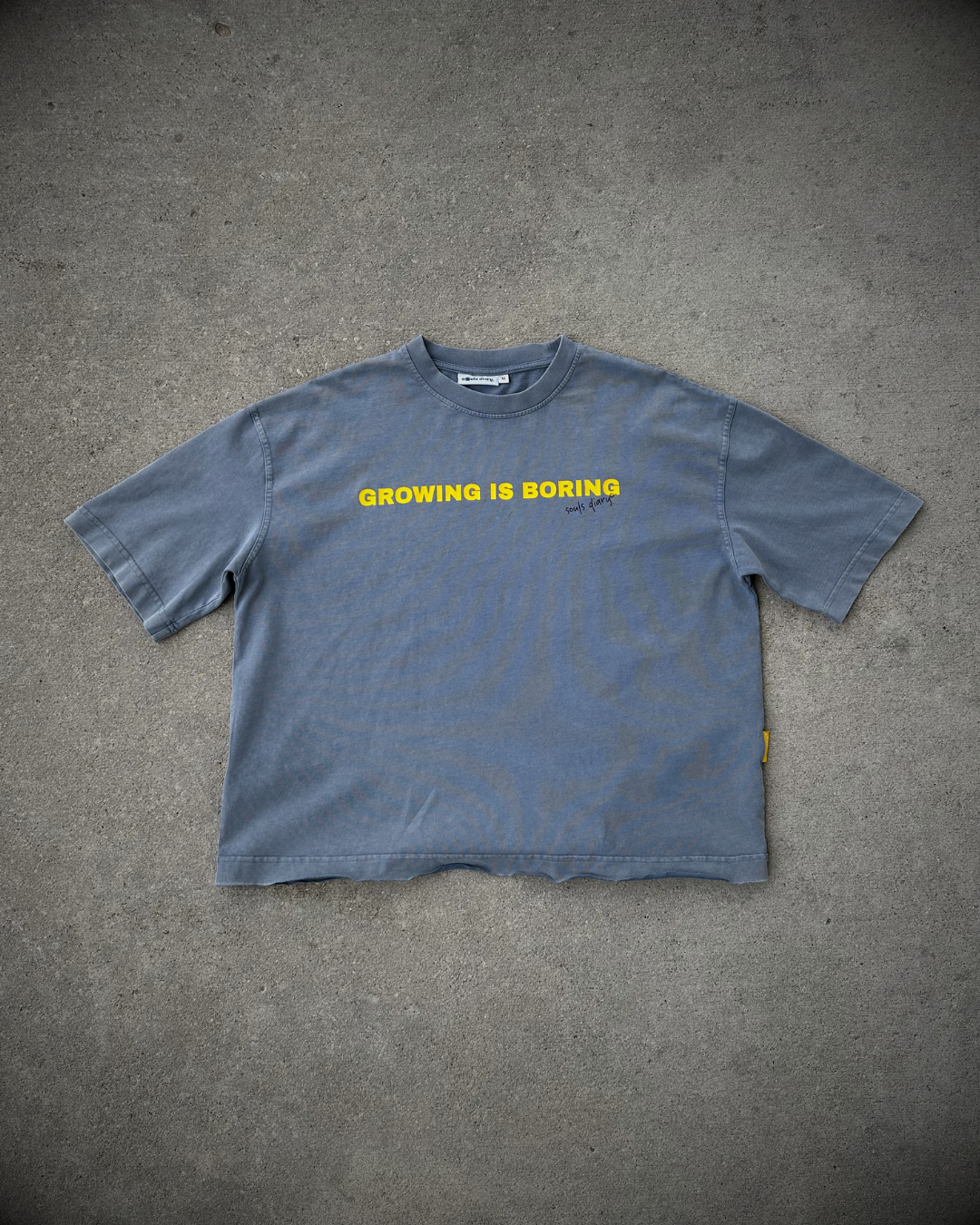 "boring" tee in stone blue