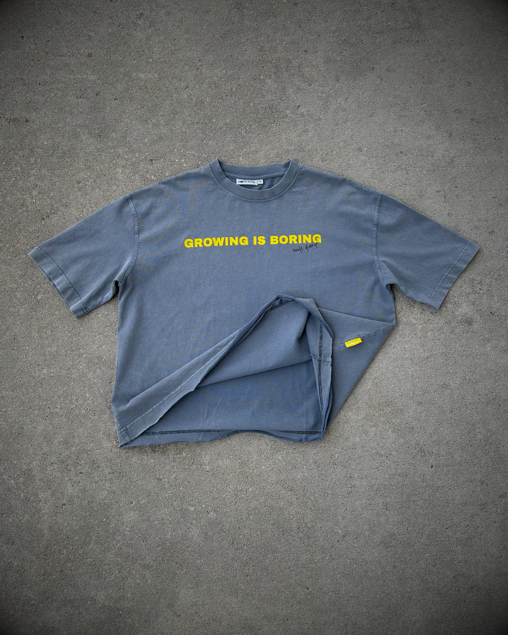 "boring" tee in stone blue