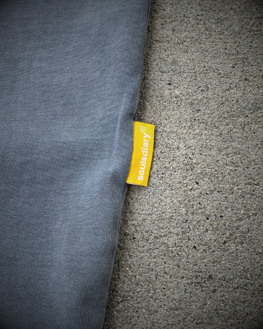 "boring" tee in stone blue