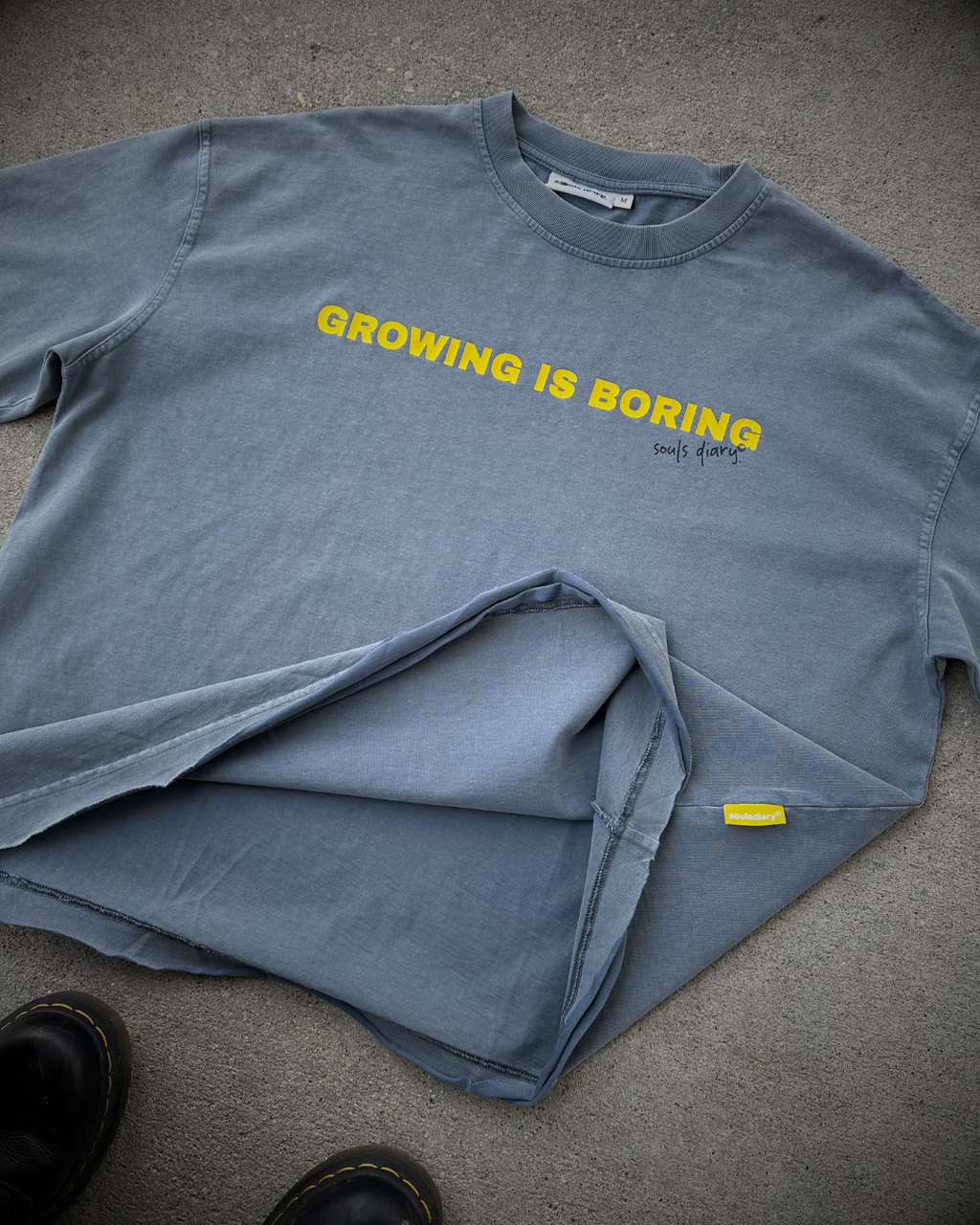 "boring" tee in stone blue