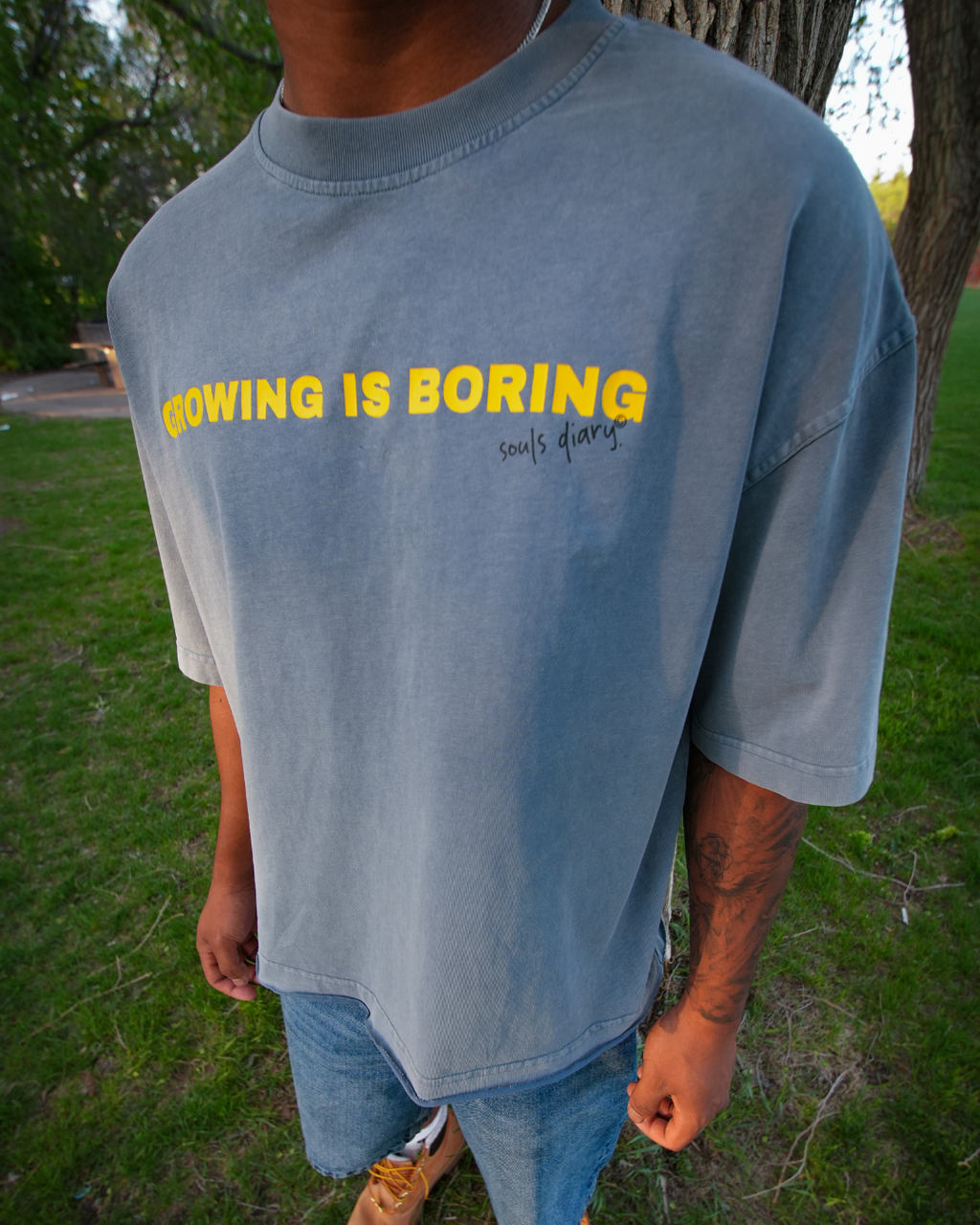 "boring" tee in stone blue