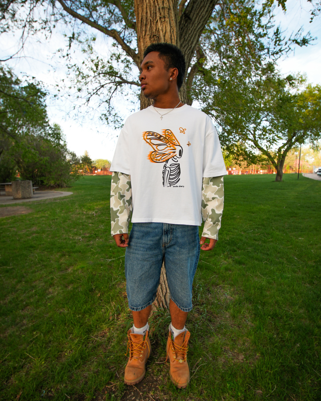 "metamorphosis" camo tee