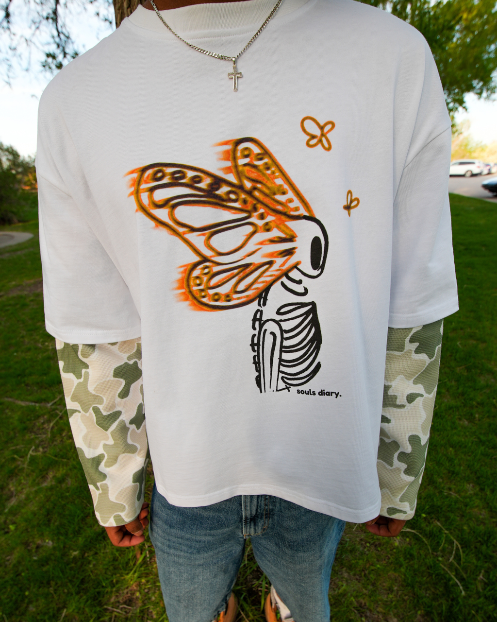"metamorphosis" camo tee